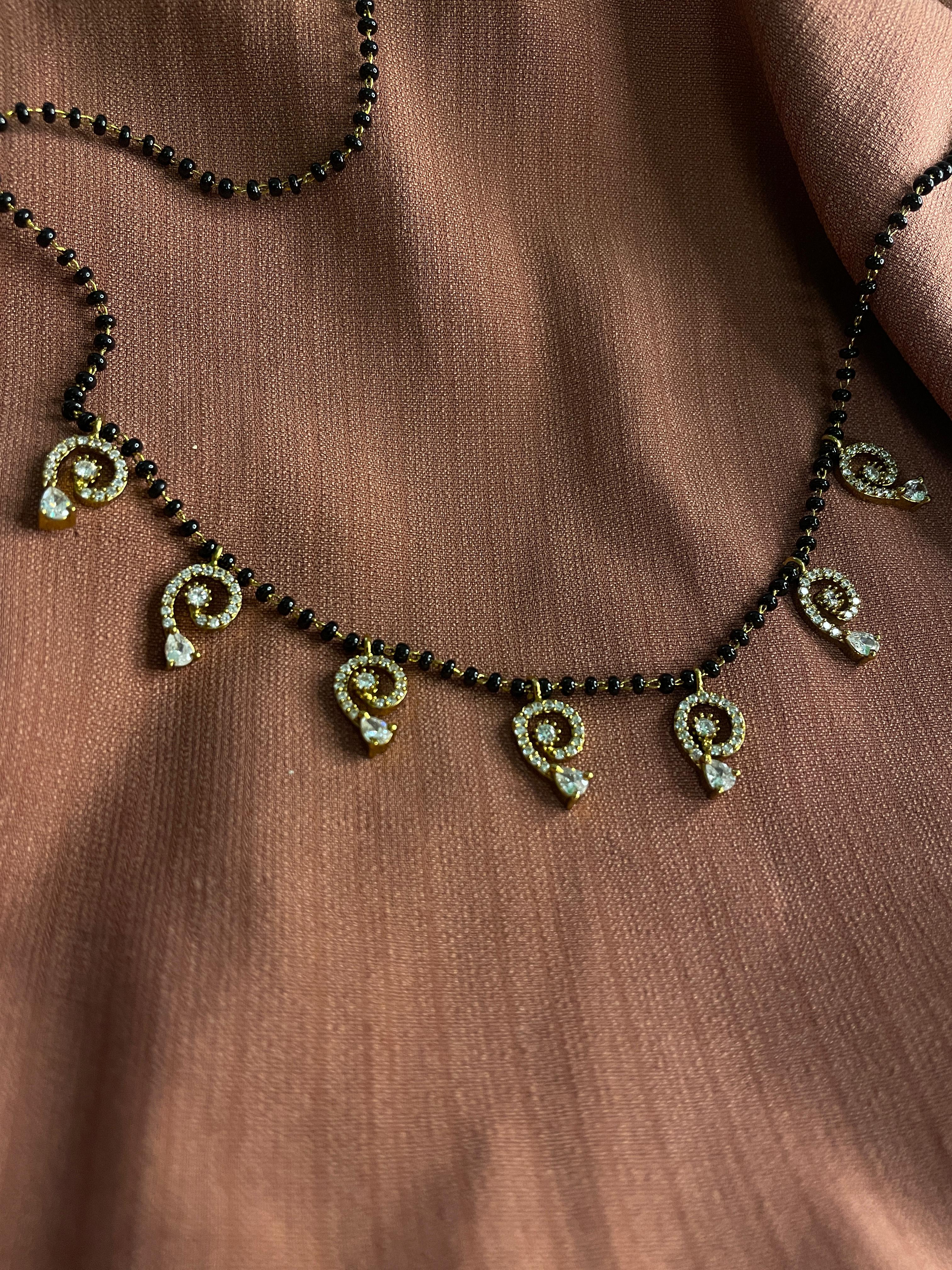 Karimani with white stone set